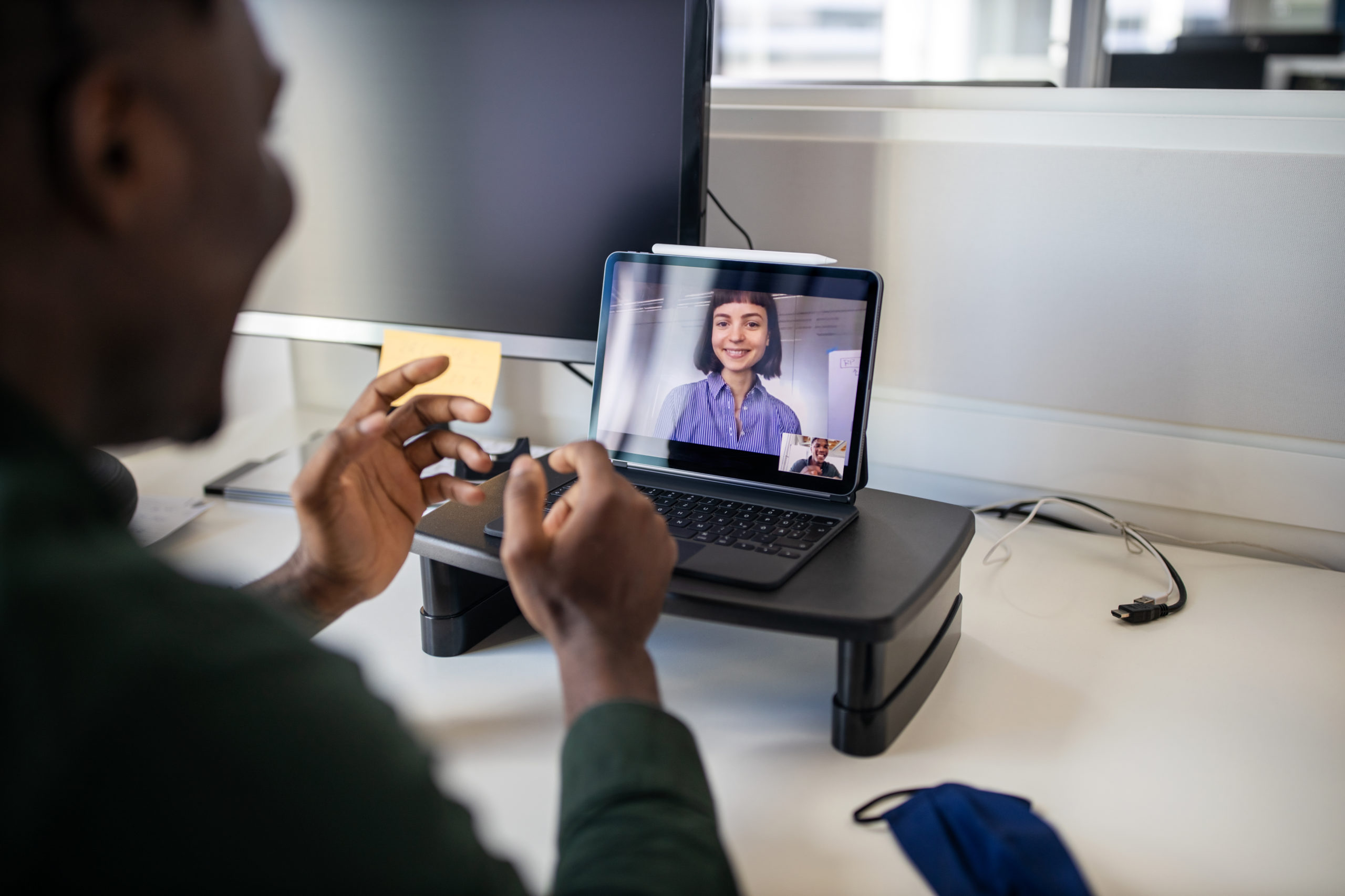 Business people video conferencing on laptop