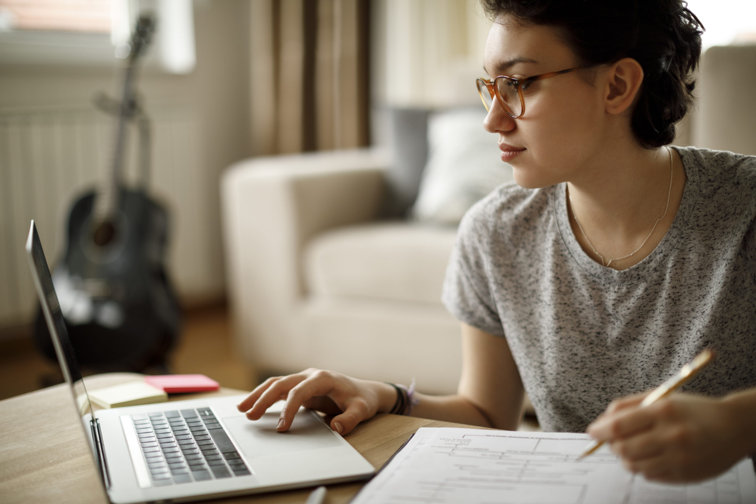 Young woman working at home