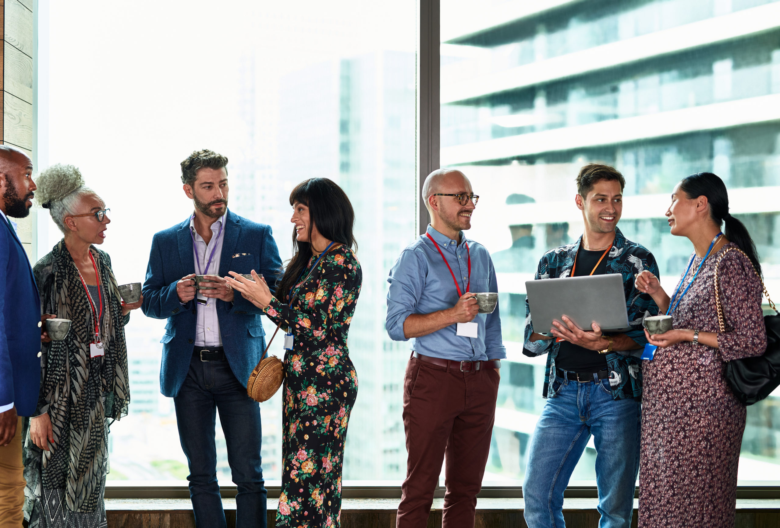Business people chatting at corporate event, meeting after mergers and acquisitions