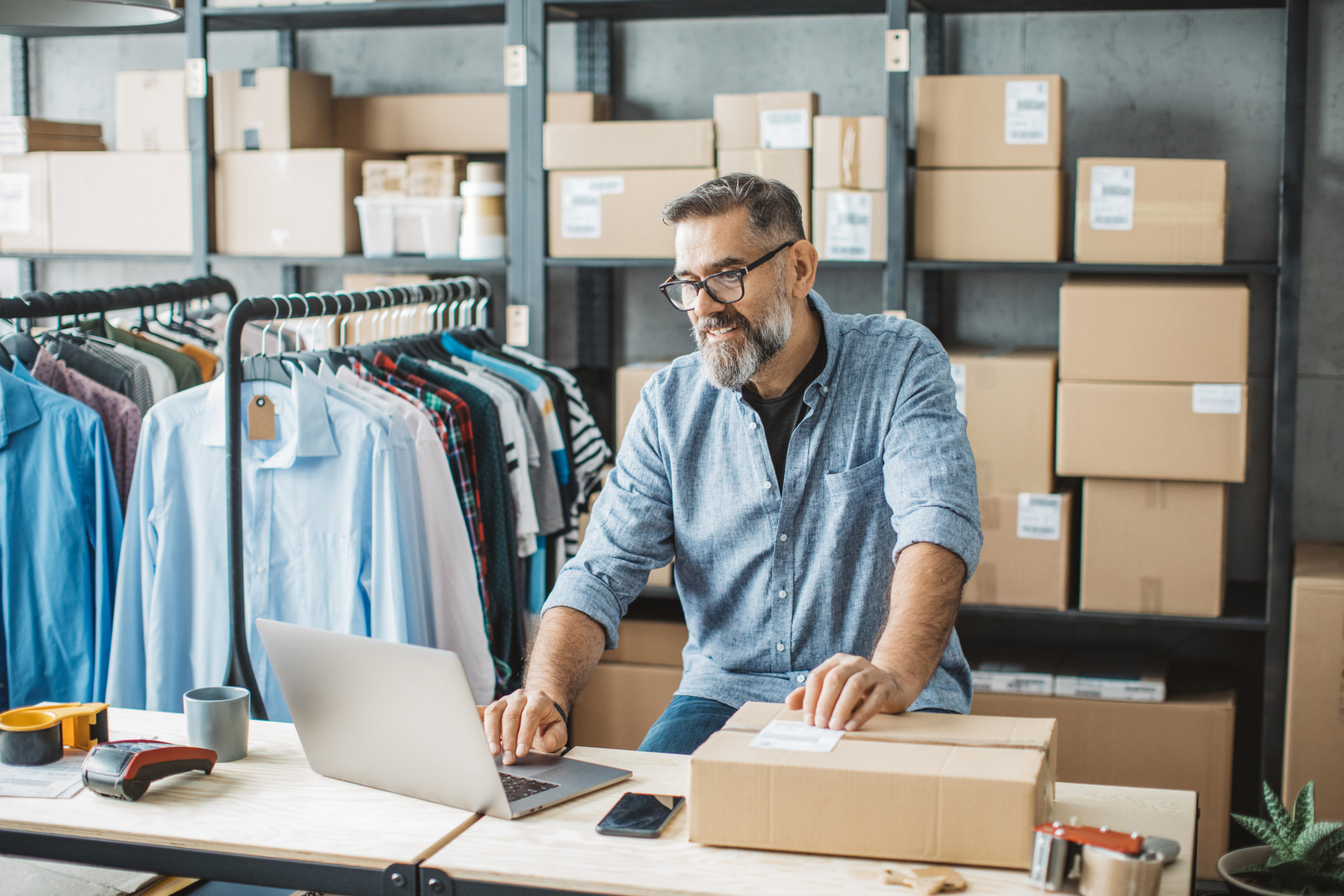 Mature man running online store