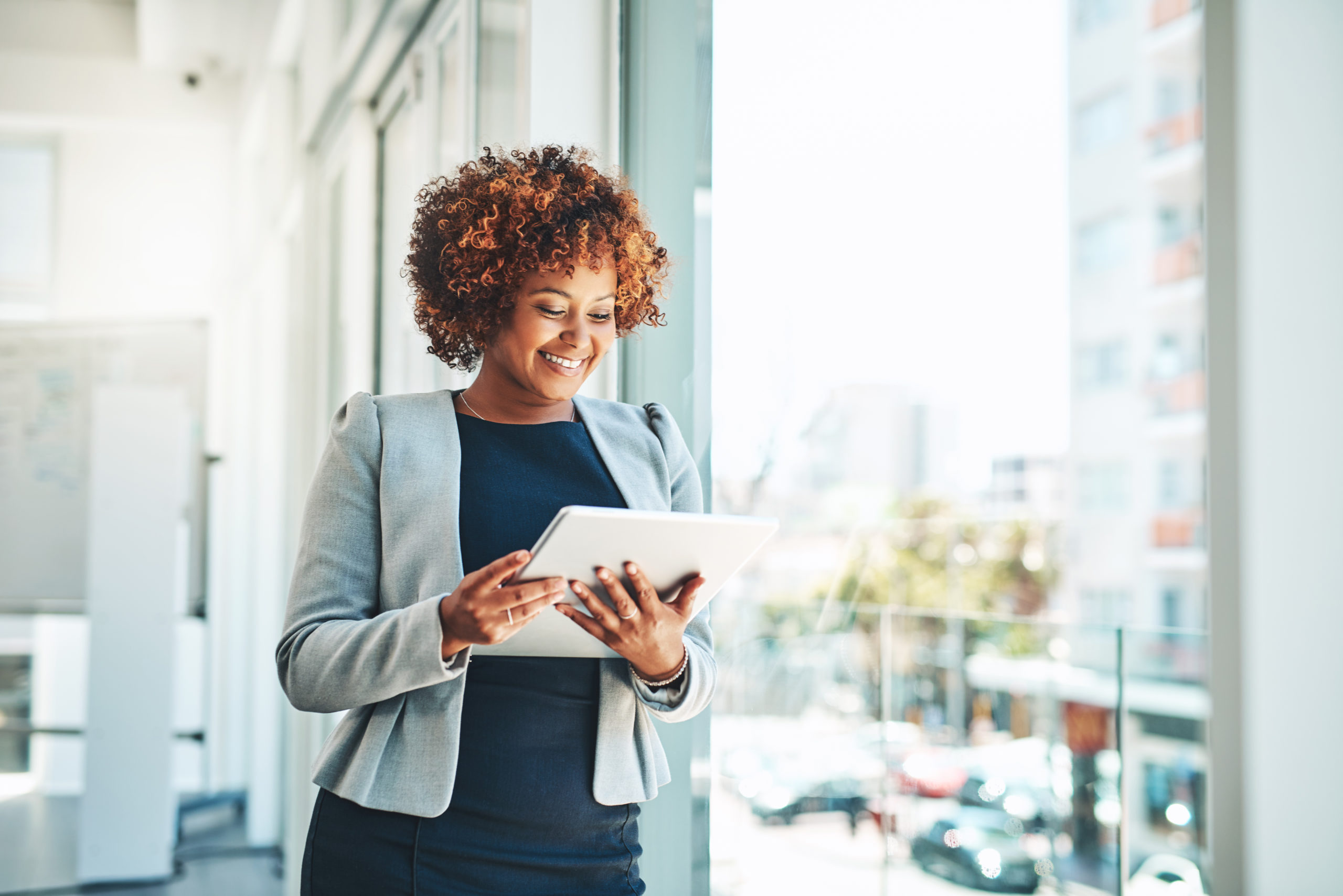 Shot of a young businesswoman using a digital tablet in an office