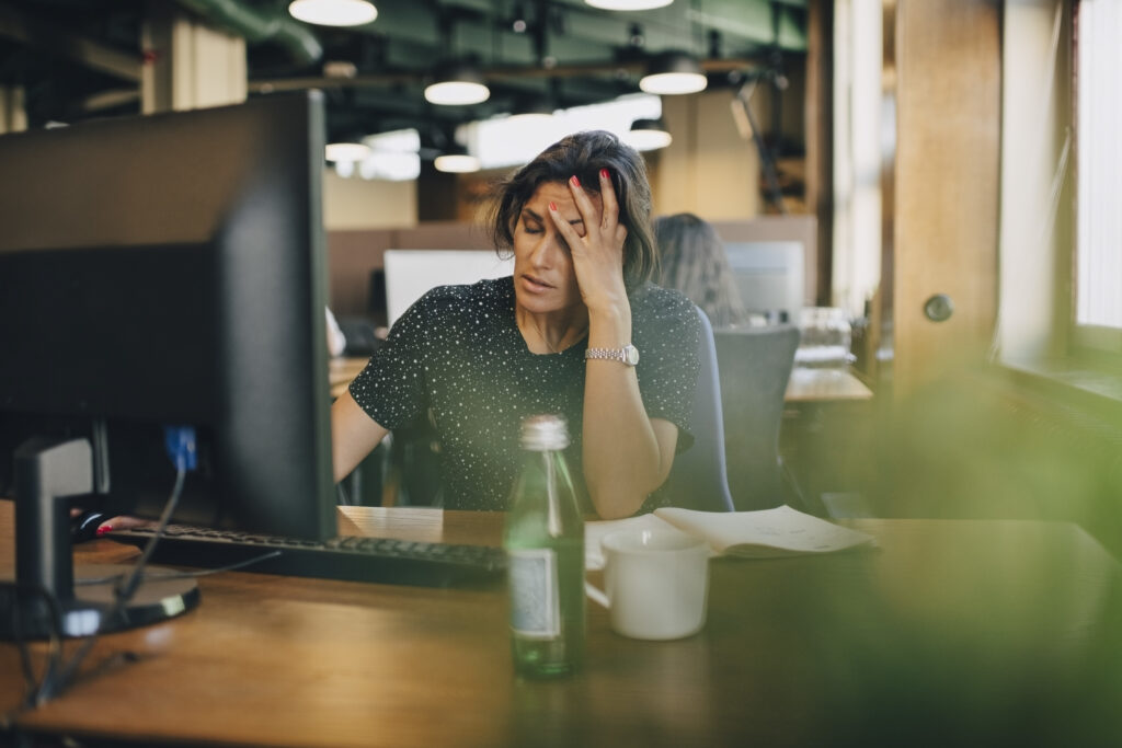 Business woman dealing with workplace conflict