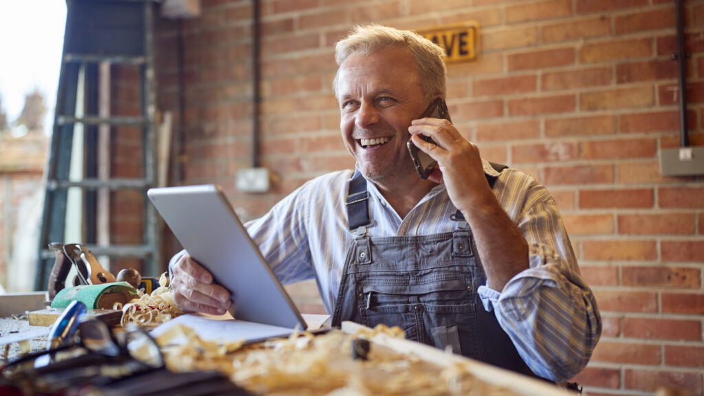 A business owner discussing HR outsourcing for his SME
