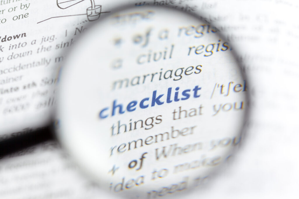 Magnifying glass highlighting the definition of an HR checklist